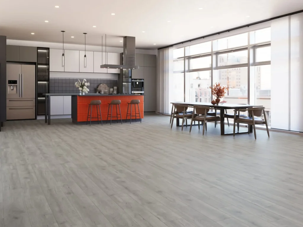 Light oak-look plank flooring in an open-concept kitchen and dining room
