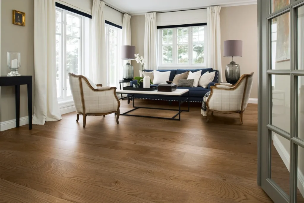 Wide-plank oak flooring in a styled modern interior