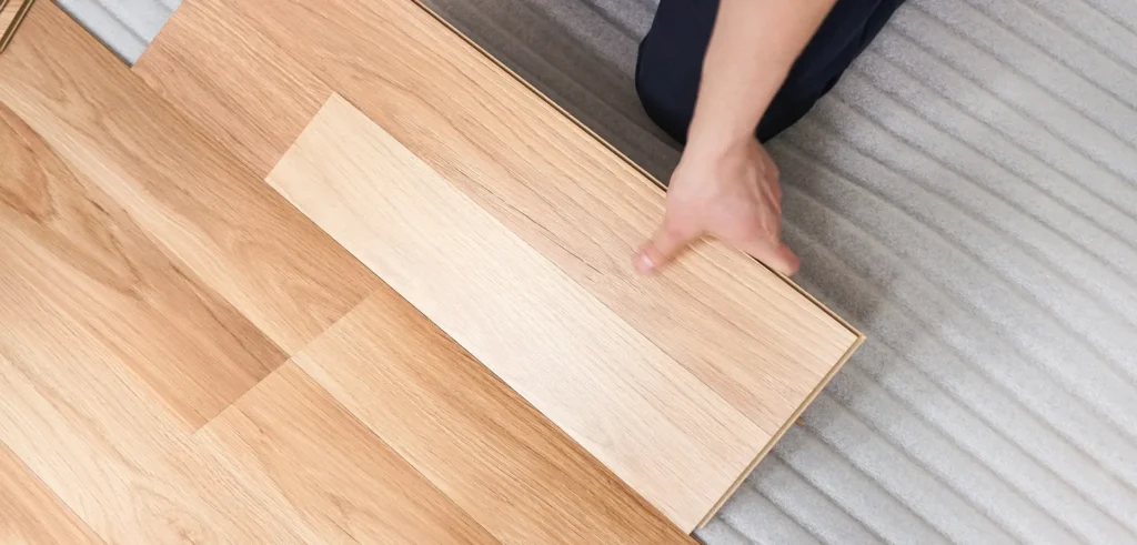 Wide-plank oak flooring in a styled modern interior