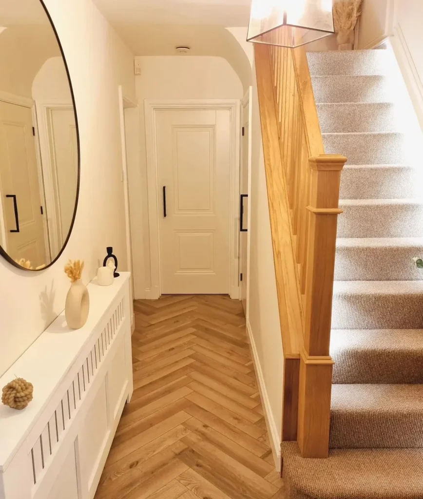 Chevron hardwood floor installed by 22FLOORING in a Toronto hallway