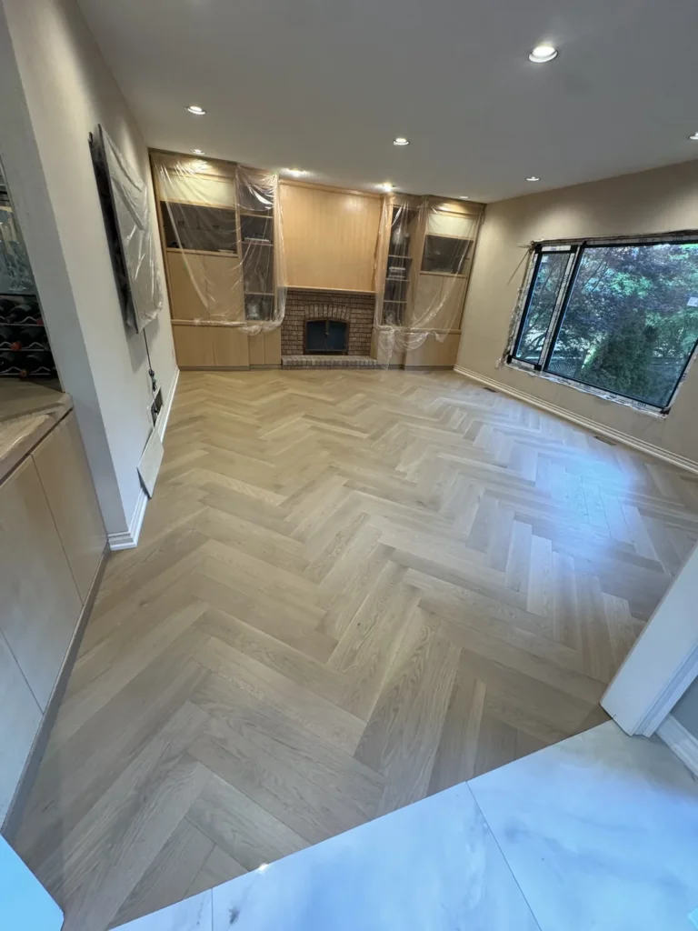 Herringbone hardwood floor installed by 22FLOORING in a Richmond Hill home